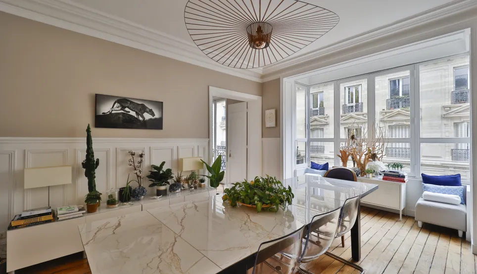 Elegant Parisian luxury dining/office. Chic design, bright with city views. Modern furniture, refined ambiance. Ideal for an exceptional property.