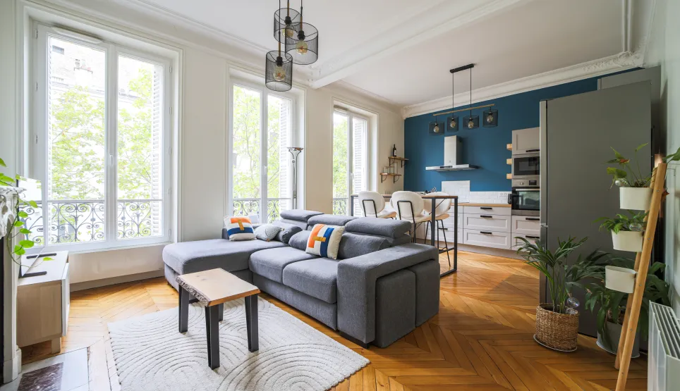 Stunning luxury apartment with open-plan living-kitchen, herringbone parquet, large bright windows. Modern and elegant design.