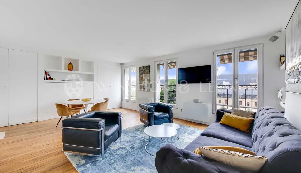 Bright luxury living-dining room, modern design, balcony view. Parisian elegance for an exceptional apartment.