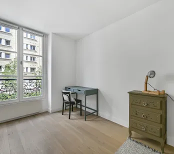 Luxury apartment: bright room, hardwood floor, open view. Ideal elegant bedroom/office. Parisian charm and potential.