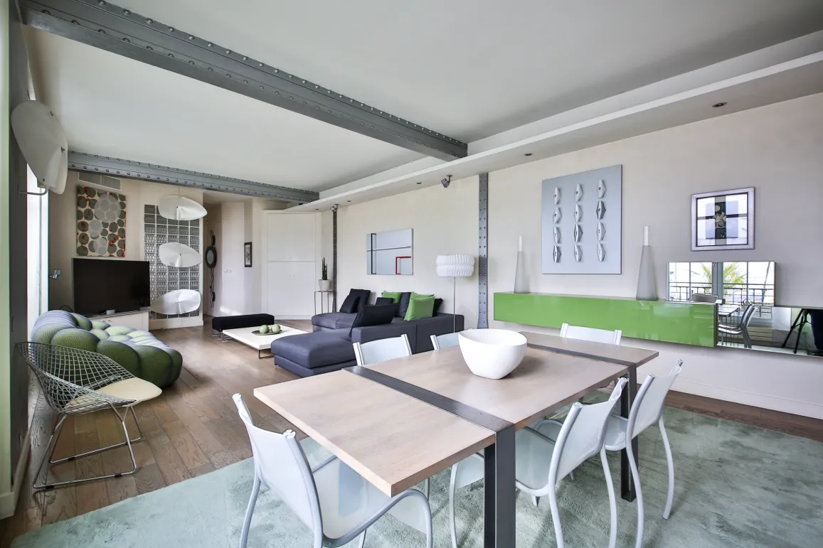Stunning luxury loft, contemporary design. Bright living-dining area, elegant furniture, industrial beams. Modern and spacious living space.