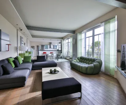 Spacious, bright luxury living room with contemporary design, open kitchen, and clear views. Perfect for a high-end apartment.