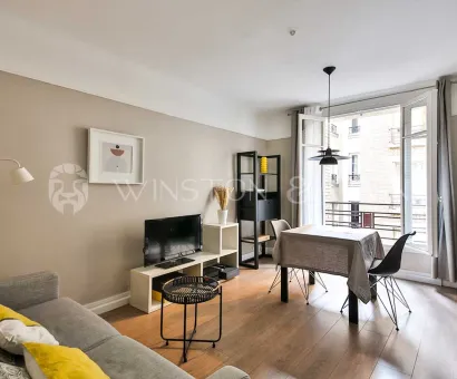 Luxury apartment: modern, bright living-dining room with balcony. Sleek design, optimal comfort. Perfect for city living.